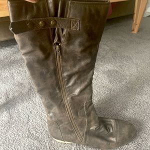Tall brown calf high boots